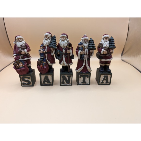 Vintage set of 4 in. Santa Resin Figurines signed Jo Draper 1998